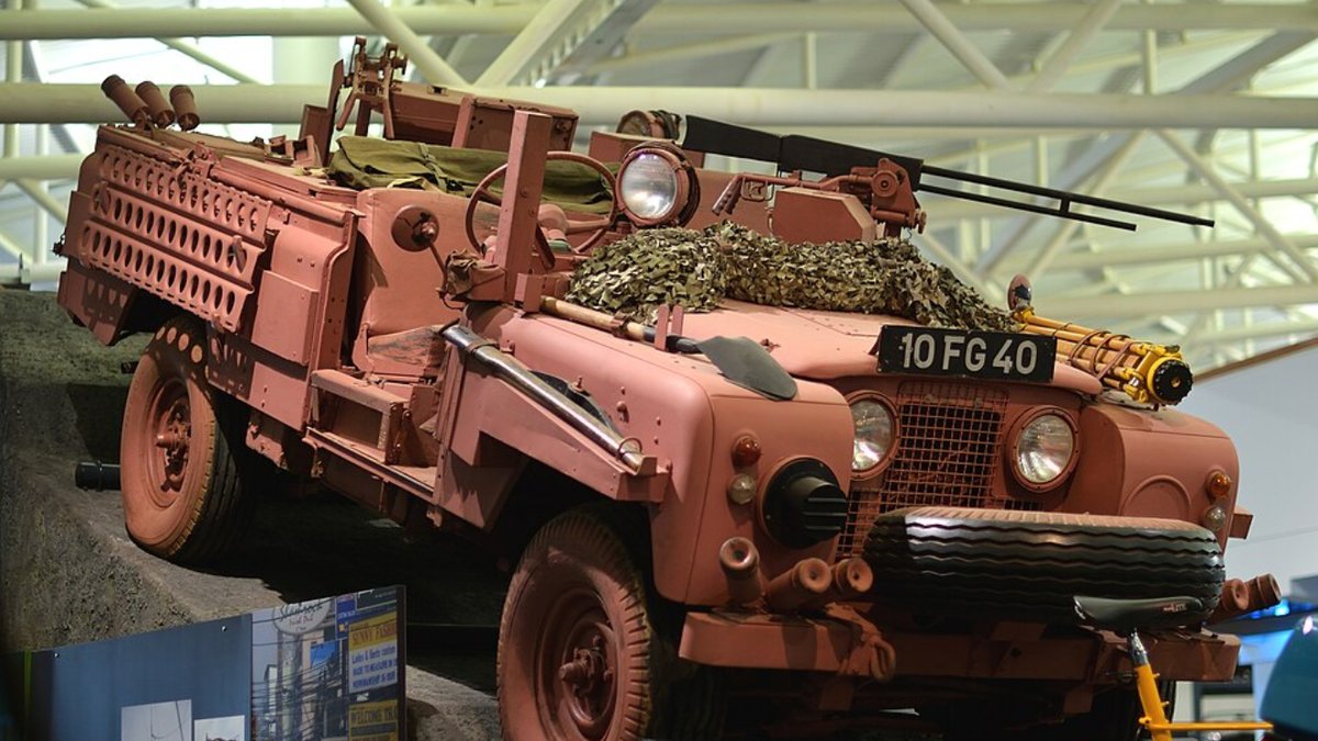 Modified armoured Land rover, built for the desert and camouflaged appropriately, at the British Motor Museum, Warwick.
