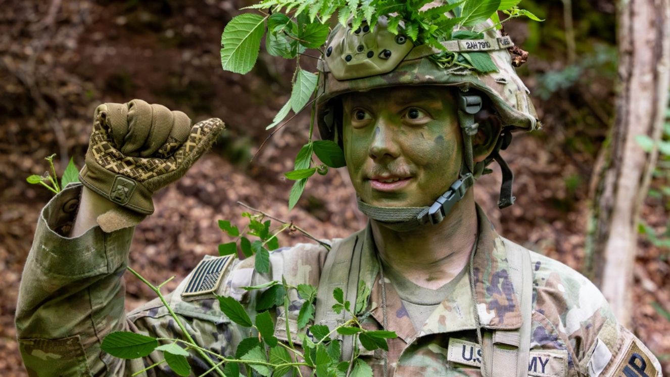 U.S. Army Pfc. Aidan Hahn, a military police officer assigned to 92nd Military Police Company, 709th Military Police Battalion, 18th Military Police Brigade, conducts hand and arm signals for the 709th MP Battalion quarter board competition at U.S. Army Garrison Baumholder.