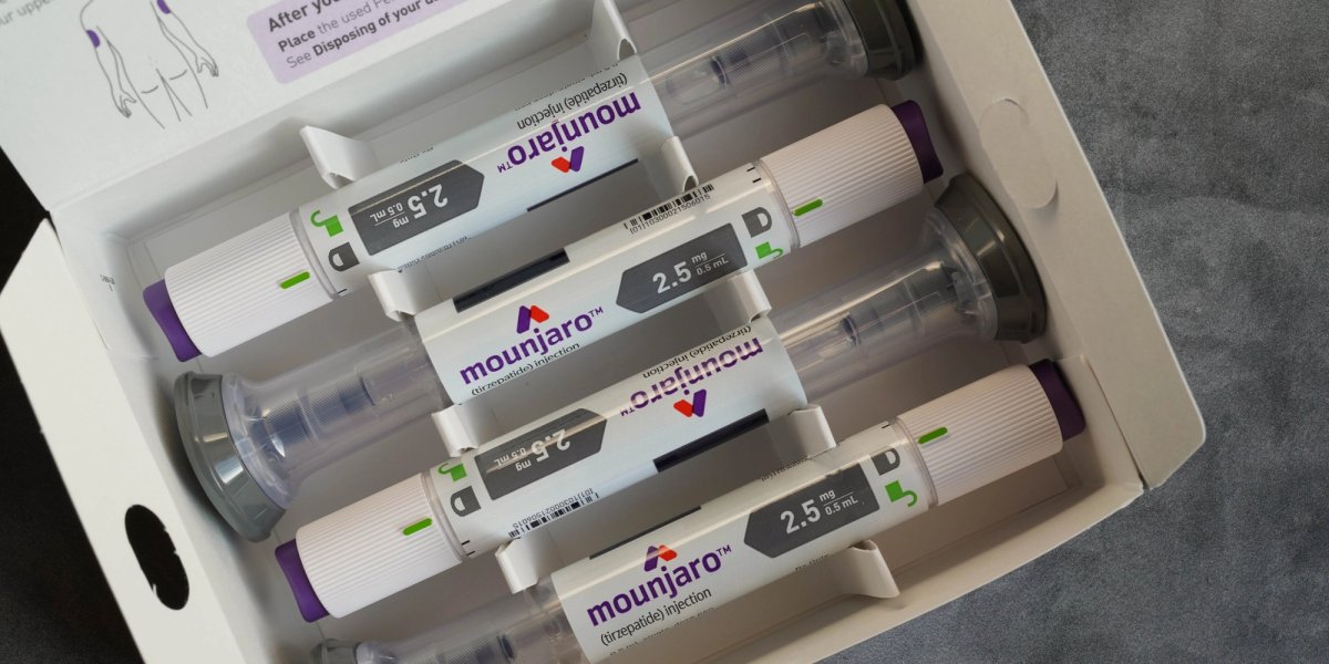 Four medication pen syringes for the drug Mounjaro.