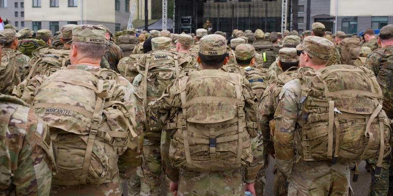U.S. Soldiers assigned to 1st Battalion, 12th Cavalry Regiment, stand in formation during a pre-ruck brief before a 16-kilometer memorial ruck march hosted by NATO Multinational Battle Group Lithuania at Rukla, Lithuania, April 17, 2026. 