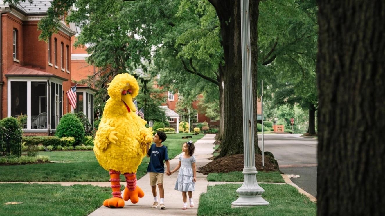 The two oldest children from the Williams family share a special moment with Big Bird May 15 on Joint Base Myer-Henderson Hall. 