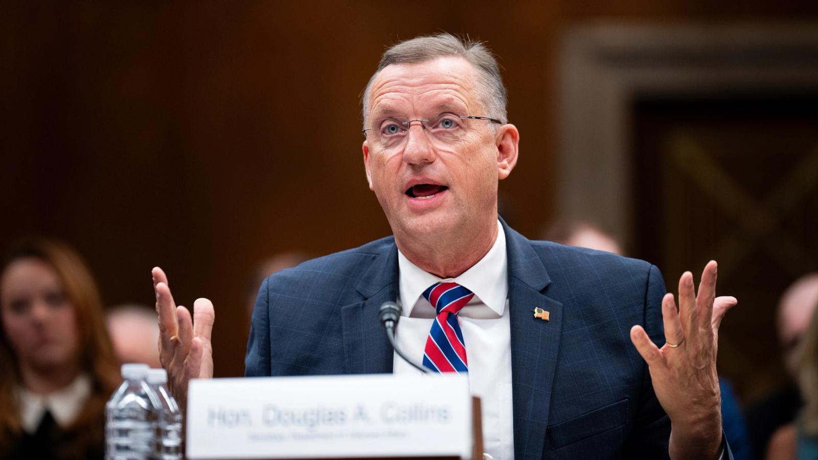Secretary of Veterans Affairs Doug Collins gestures as he speaks at a Senate hearing.