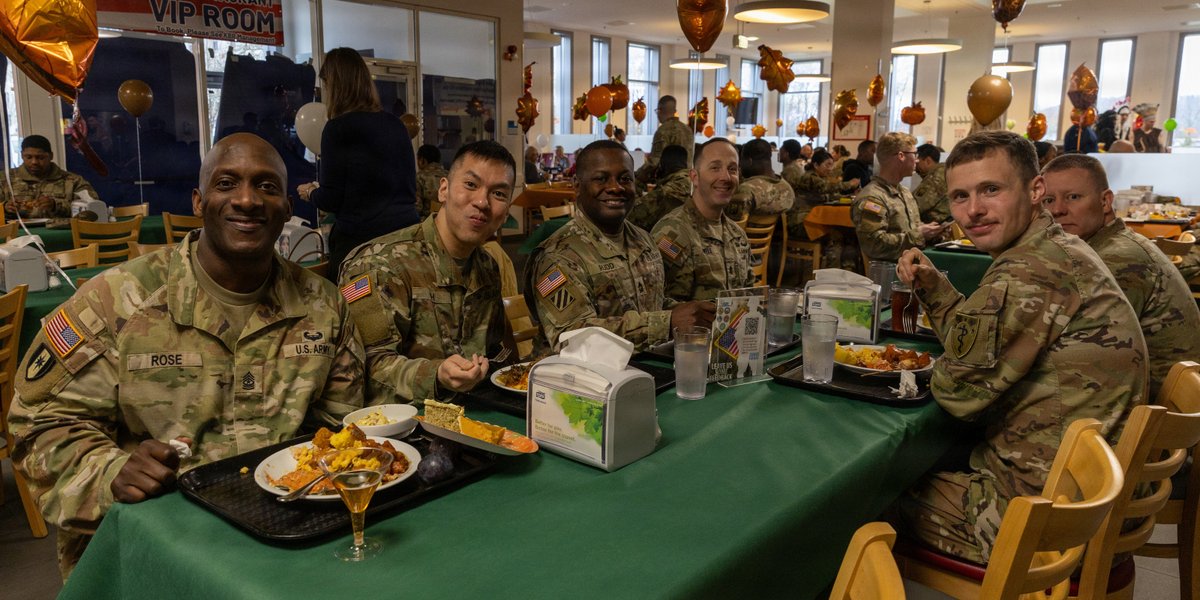 U.S. Army Soldiers assigned to 68th Theater Medical Command pose for a photo during the Defender Cafe Warrior restaurant’s Thanksgiving meal on Rhine Ordinance Barracks, Kaiserslautern, Germany, Nov. 25, 2025.