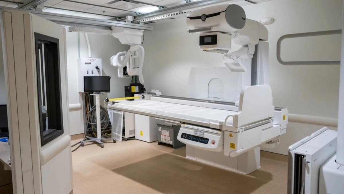 VA medical center radiology room with modern imaging equipment and monitor.