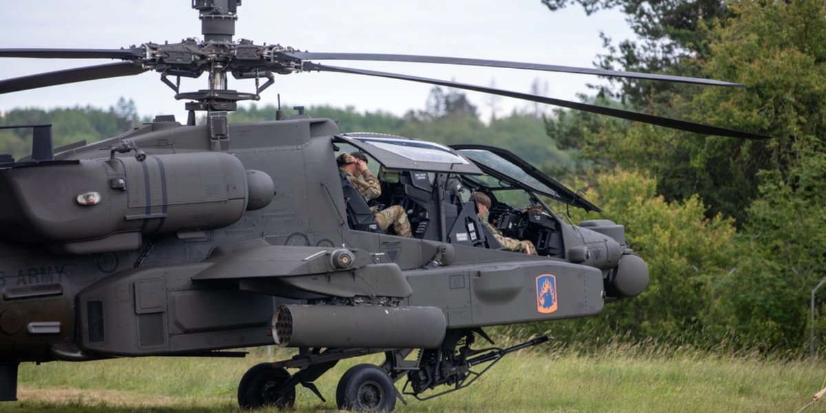 U.S. Soldiers, assigned to the 12th Combat Aviation Brigade, prepare to fly an AH-64E Apache Guardian helicopter during an Aerial Gunnery Qualification exercise in Rheinland-Pfalz, Baumholder, Germany.