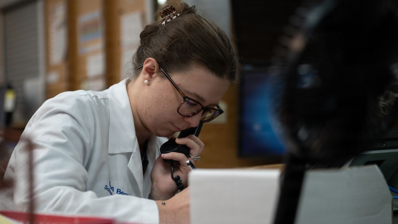 Pharmacy intern answers the phone.