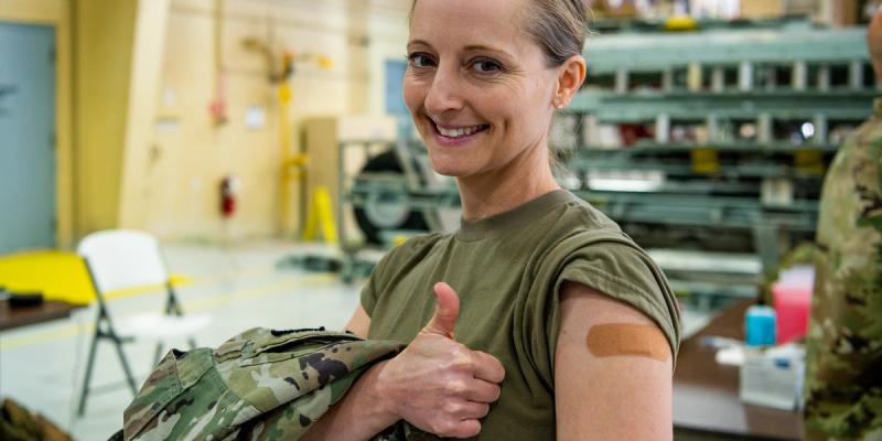 U.S. Air Force Master Sgt. Anna Picken, a cyber systems operator with the 264th Combat Communications Squadron, Illinois Air National Guard, gives a thumbs up after receiving the influenza vaccination during drill weekend at the 182nd Airlift Wing in Peoria, Illinois, Nov. 2, 2024. 