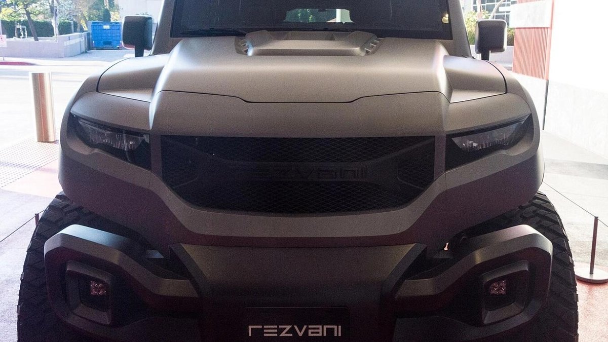 Rezvani Tank luxury SUV with aggressive front design parked in urban setting