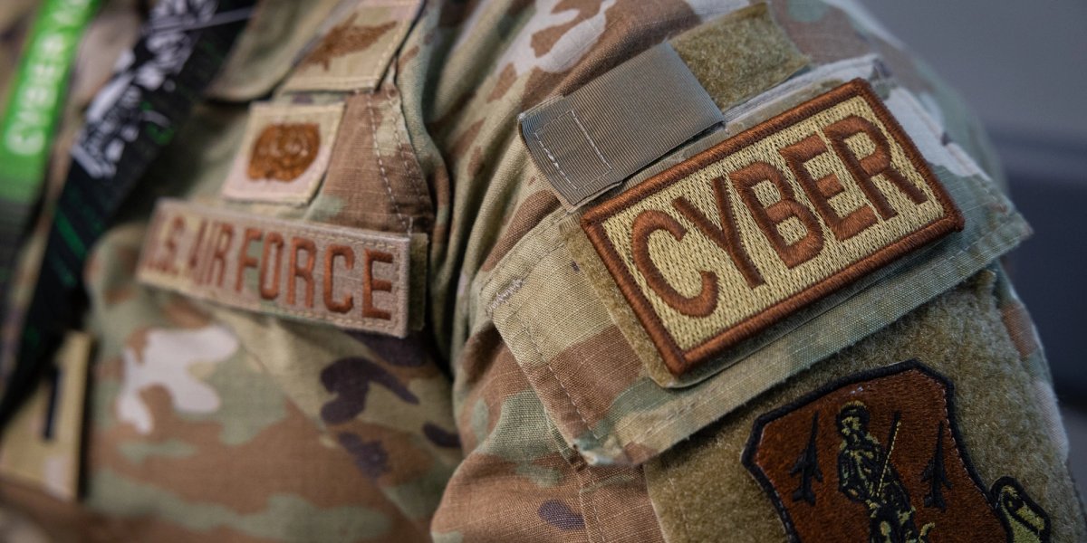 Side view of a serviceman’s shoulder patch “CYBER” it reads.