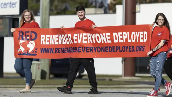 Red Fridays: Honoring Deployed Troops with Civilians' Support