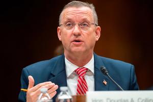 Secretary Doug Collins speaks at a hearing.