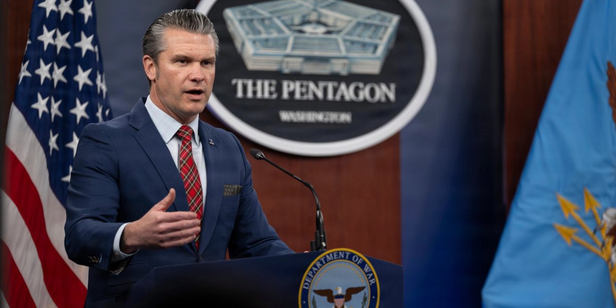 Secretary Hegseth speaks at a podium.