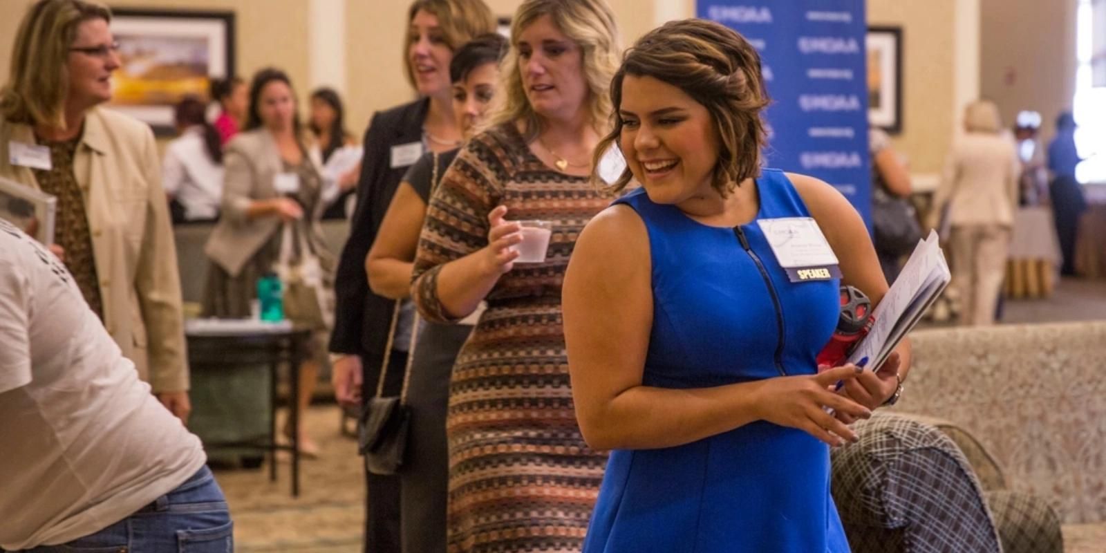 Military spouses networking at MSCAP Fellowship event indoors