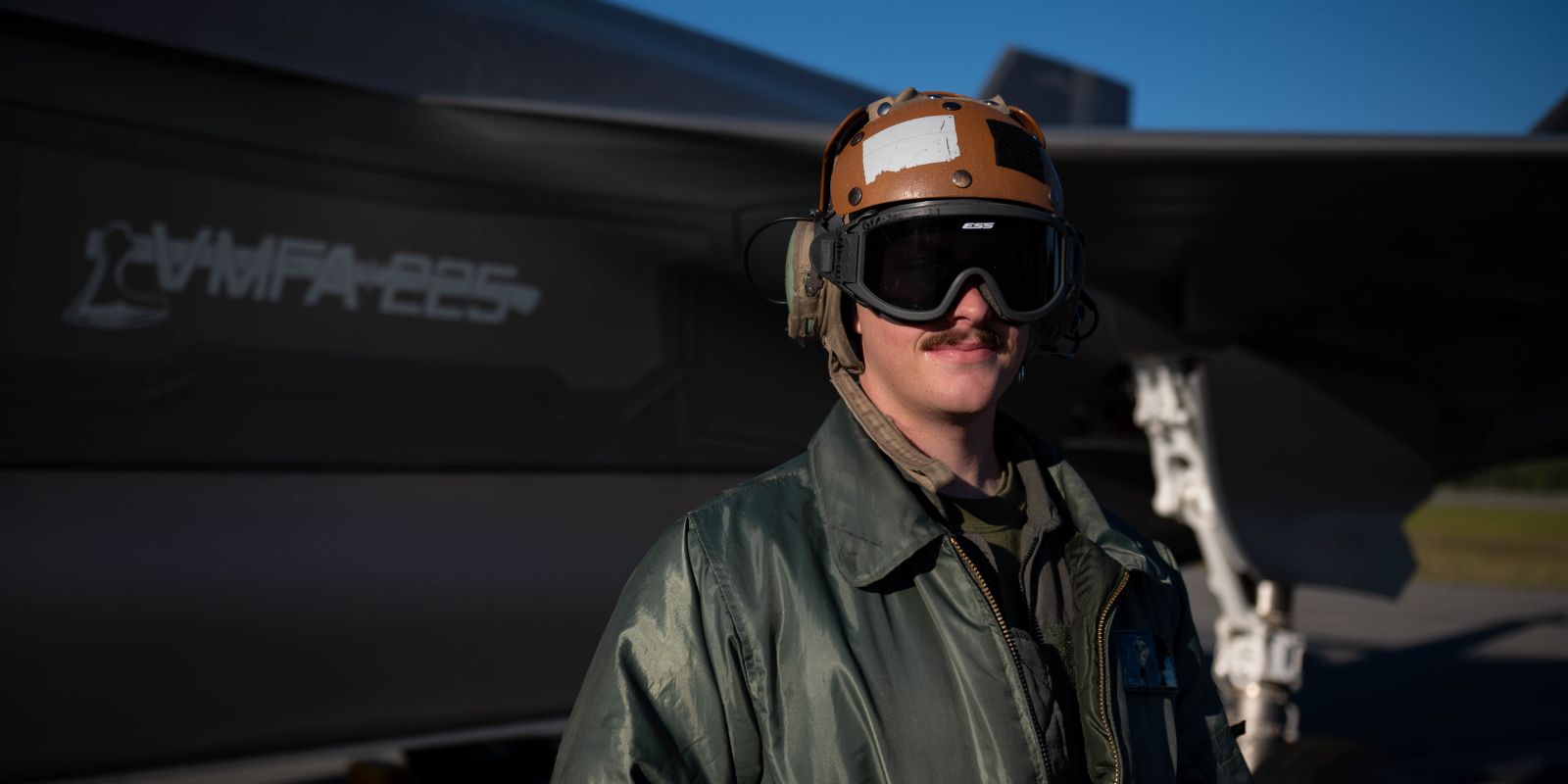 U.S. Marine Corps Lance Cpl. Cameron Owans, Marine Fighter Attack Squadron 225 powerline mechanic, performs a preflight check on an F-35B Lightning II during RED FLAG-Alaska 22-3 at Eielson Air Force Base, Alaska, Aug. 10, 2022. RF-A is a premier training event for joint units to bolster interoperability, during which some service members partake in the tradition of growing a ‘deployment mustache’ to increase a sense of morale and camaraderie among deployed service members.