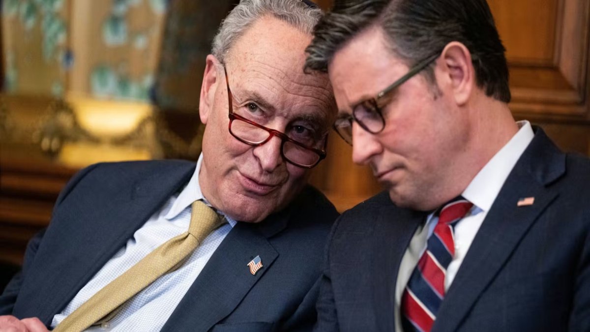 US Senator Charles Schumer and House Speaker Mike Johnson talk privately in the Senate as the end to the government shutdown nears.