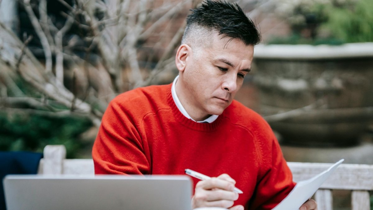 A serviceman fills out medical forms.