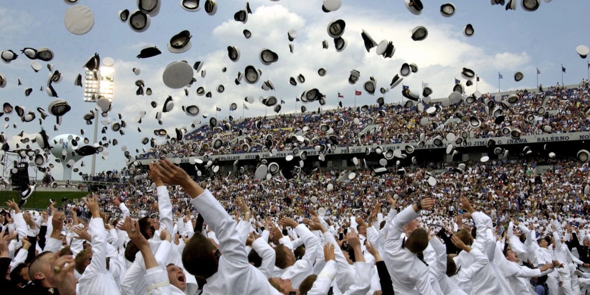 Newly commissioned Navy officers celebrate by throwing their Midshipmen covers into the air as part of the U.S. Naval Academy class of 2005 graduation and commissioning ceremony in Annapolis, Md.