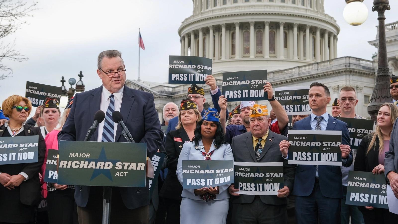 Jon Tester talks to STAR activists in front of the Capitol
