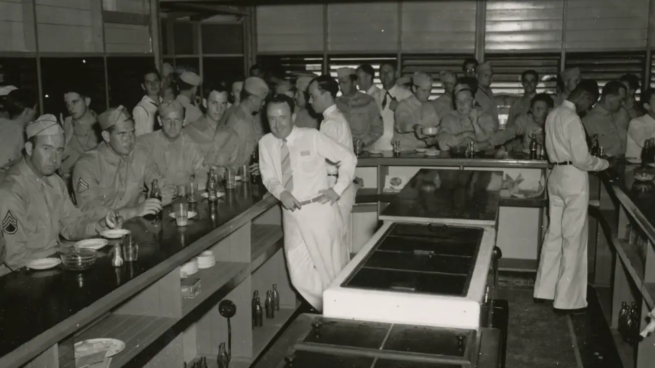 Soldiers drinking Coke products.