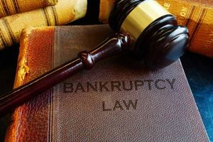 Still life of gavel and book of Bankruptcy Law.