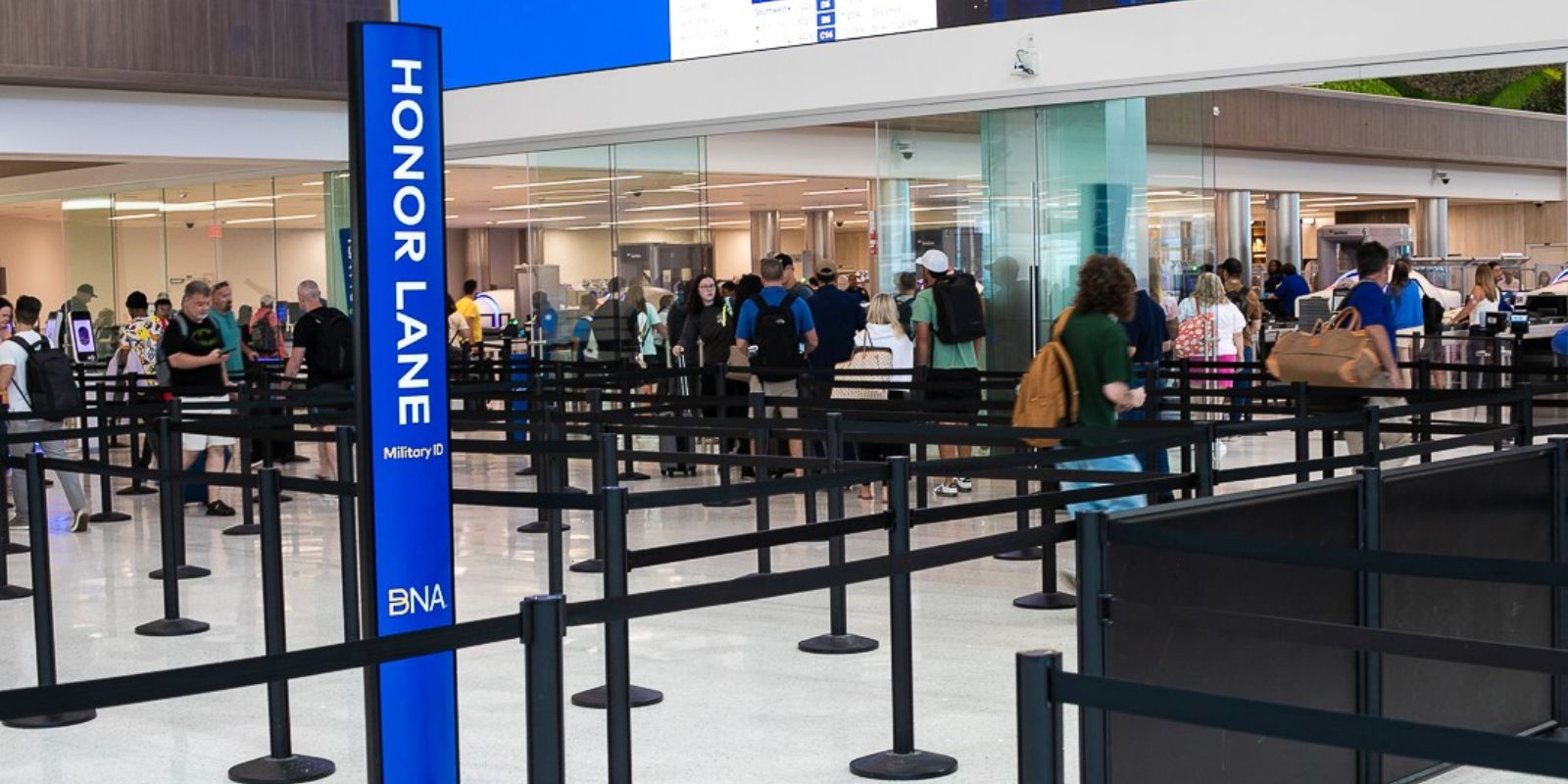 Photo of an Honor Lane at BNA (Nashville International Airport). Military/Honor Lanes are dedicated lanes at airports for active service members. Active service members will then receive screening per their active duty status. Photo by Adrian White
