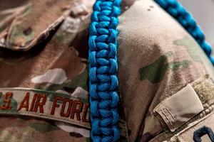 A close-up of blue rope worn to acknowledge Sexual Assault Awareness Month.