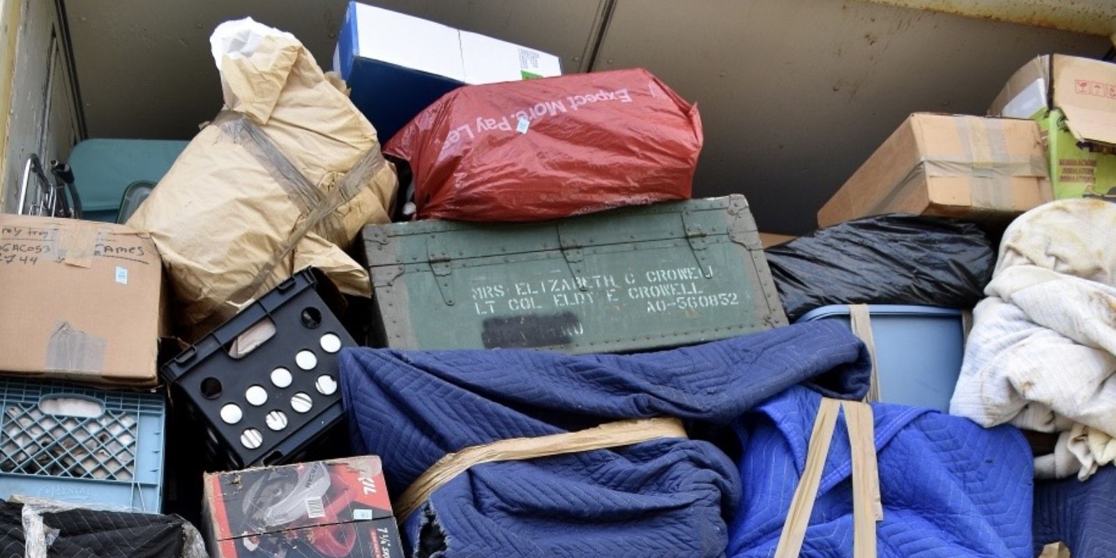 A family's household goods sustained water damage, and mold, due to a gash in the moving van.
