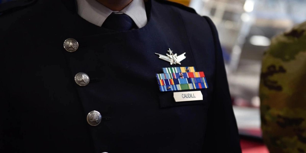 Space Force officer in formal uniform with medals and name tag