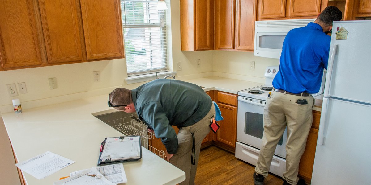 Housing inspectors at Fort Benning carry out a quality assurance inspection of a home in the Patton Village housing area to get it ready for occupancy.