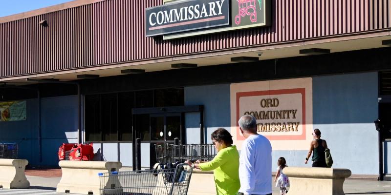Shoppers visit the Ord Community Commissary, Seaside, Calif., October 3.