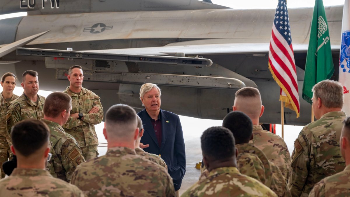Graham talks to soldiers at an Air Force base.
