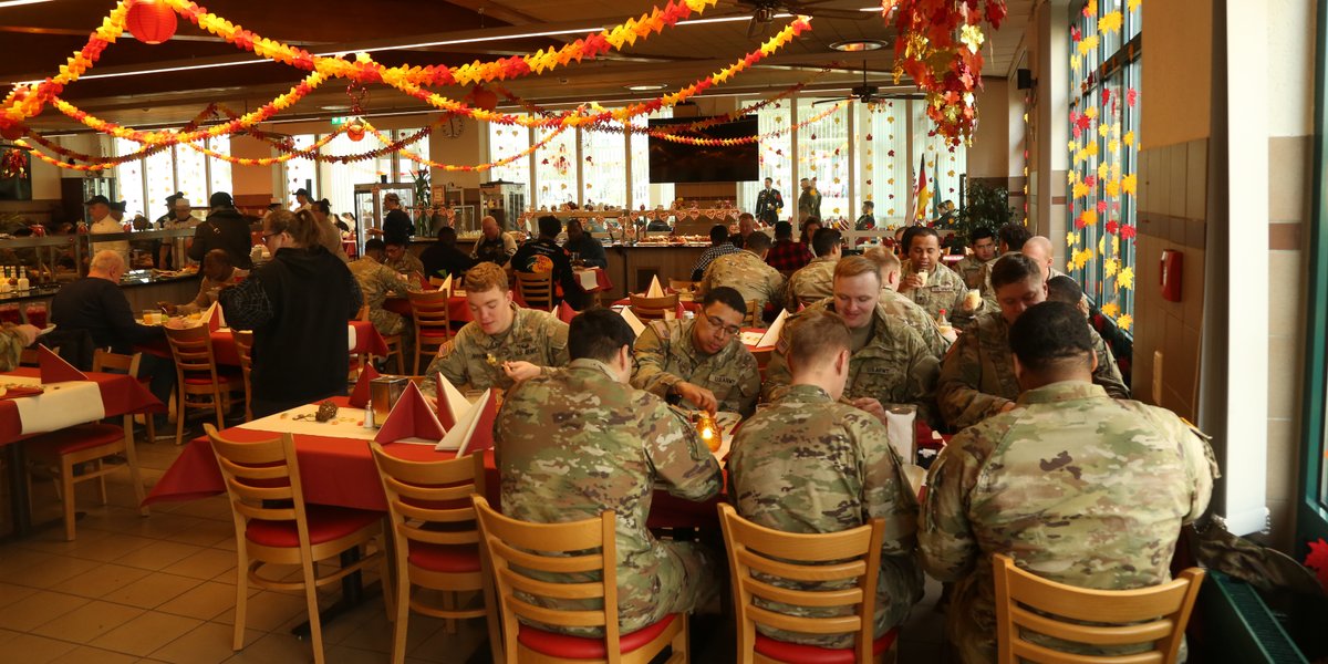 Soldiers and families enjoy a Thanksgiving meal together during the Hohenfels Thanksgiving Luncheon at the dining facility in Hohenfels, Germany, Nov. 26, 2024. (Sgt. Joseph Peake/Army)