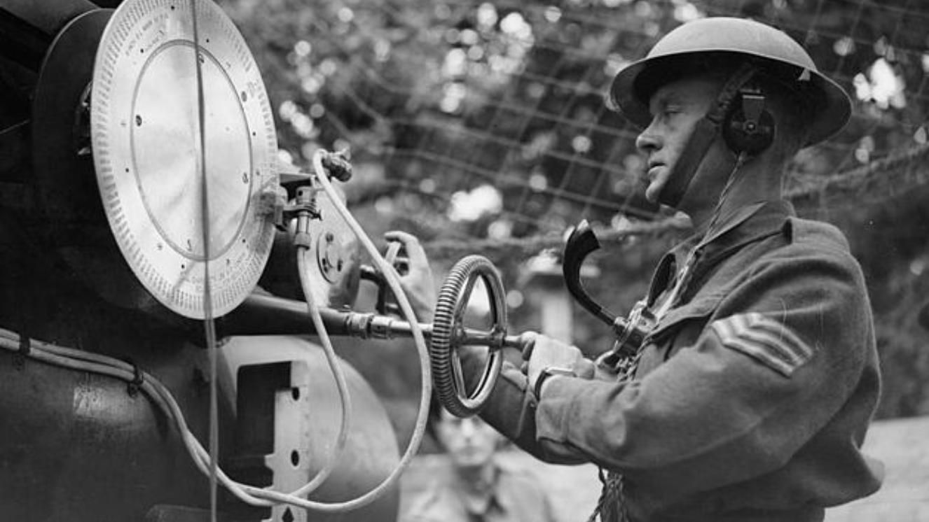 British soldier operating radar equipment during World War II.