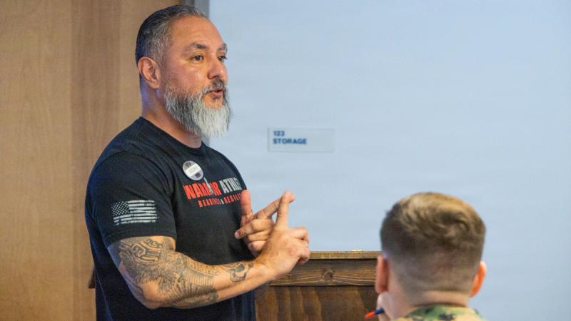  Christopher Ybarra, a substance assessment and counseling program specialist with Behavior Health Resources, Marine Corps Base Camp Lejeune, speaks about substance abuse and addiction during an Operational Stress Control and Readiness core master trainer course.