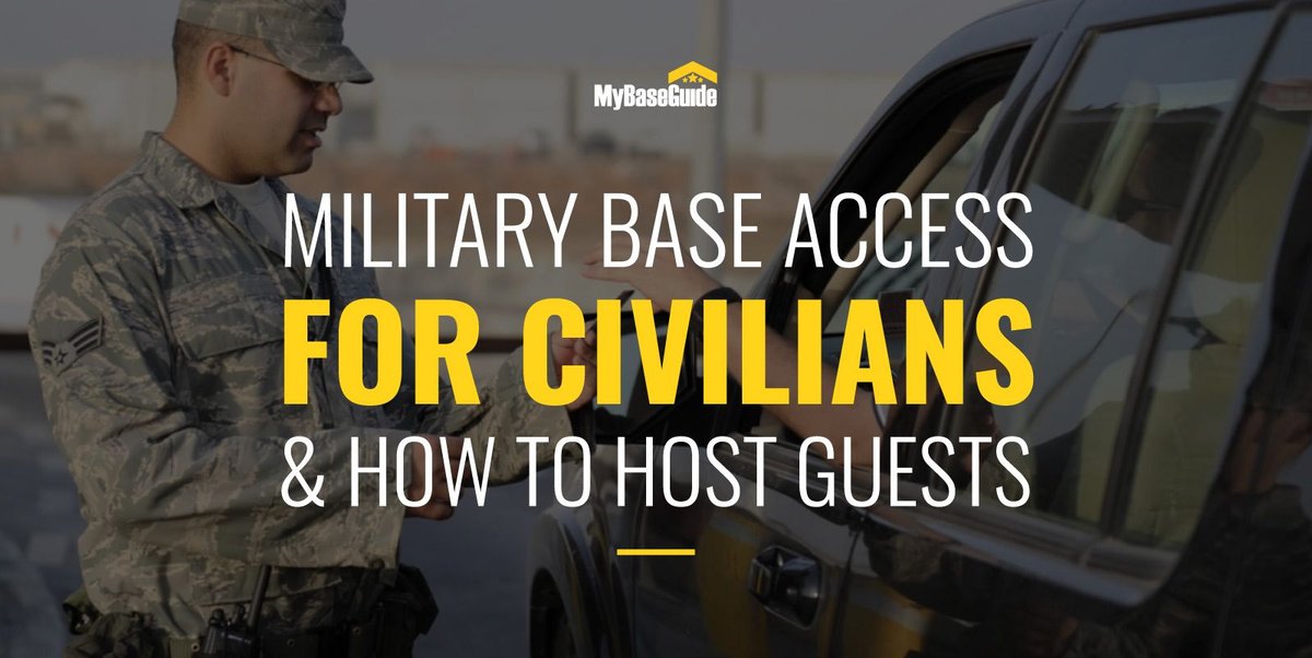 Air Force personnel checking civilian ID at military base entrance.