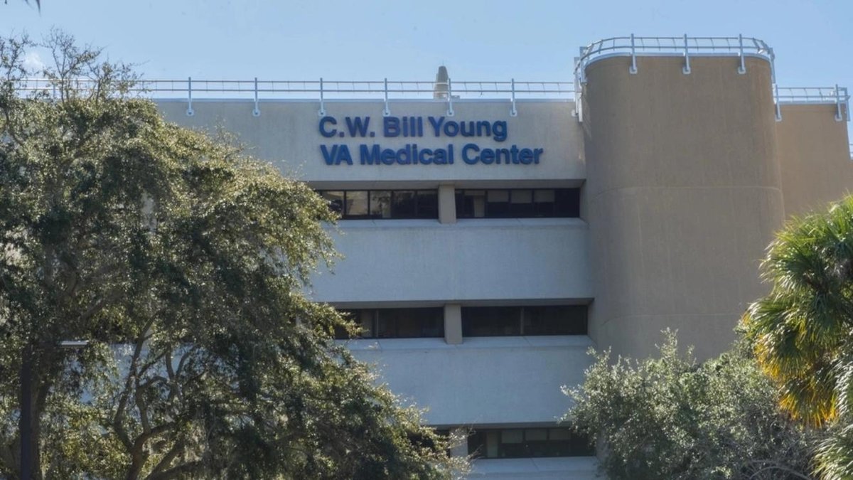 C.W. Bill Young VA Medical Center building exterior with trees in foreground