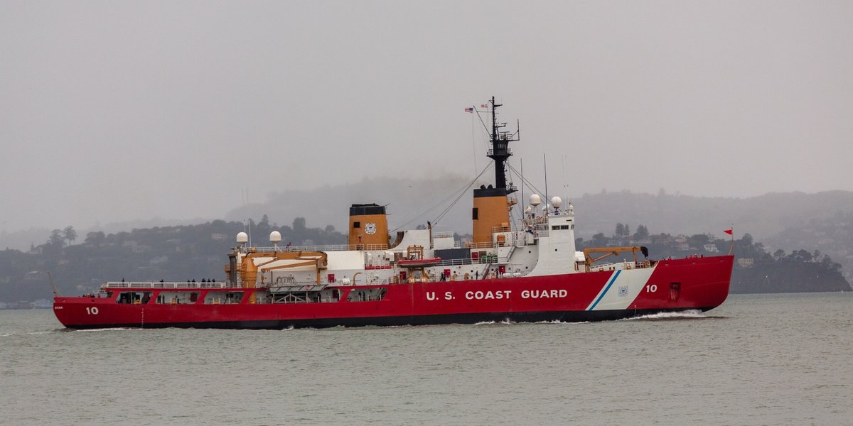 The USCGC Polar Star sailing in the ocean.
