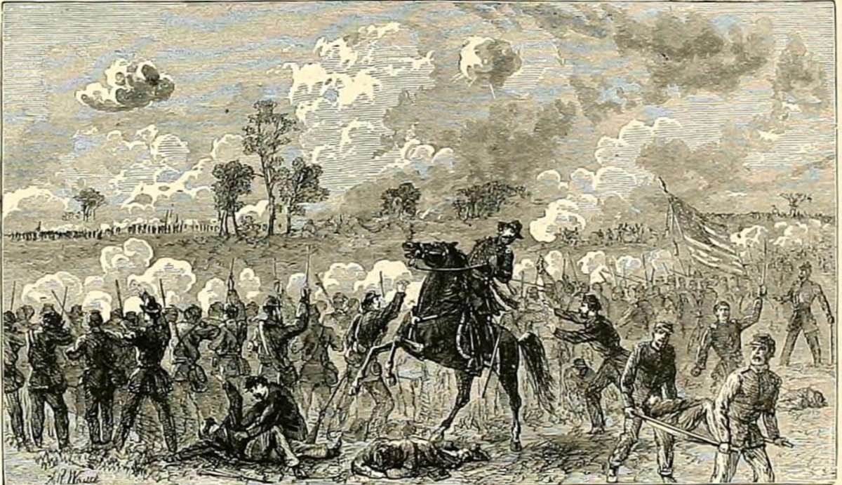 Civil War soldiers in battle with cannons firing and American flag visible in background