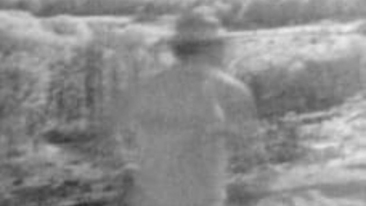 Civil War soldier apparition on Gettysburg battlefield landscape
