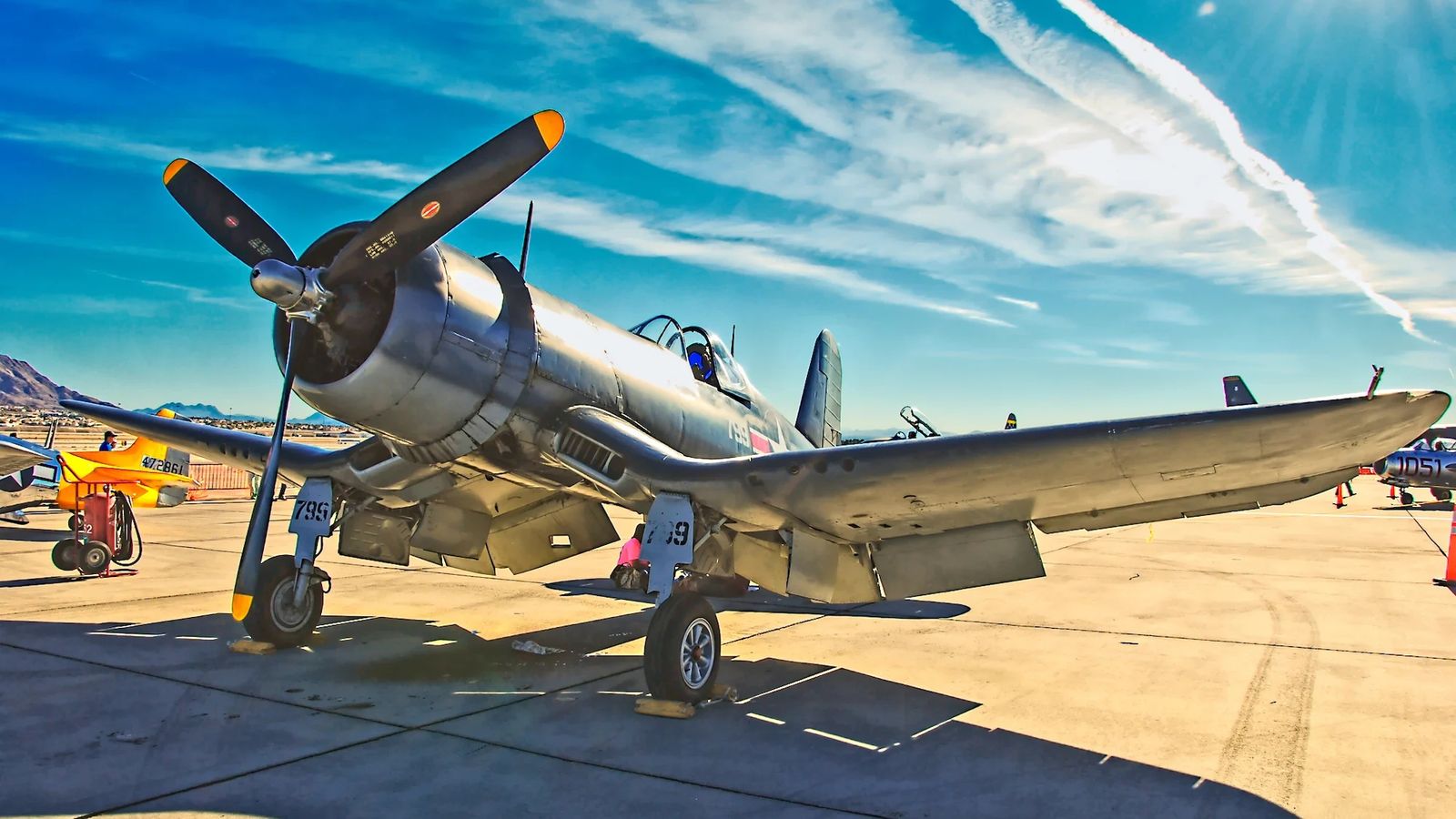 A field of vintage fighter planes.