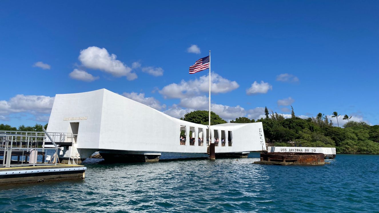 In between outreach events, members of the Naval History and Heritage Command visit the USS Arizona Memorial to remember and reflect on the events of Dec. 7, 1941.  (U.S. Navy Photo by Thomas Frezza)