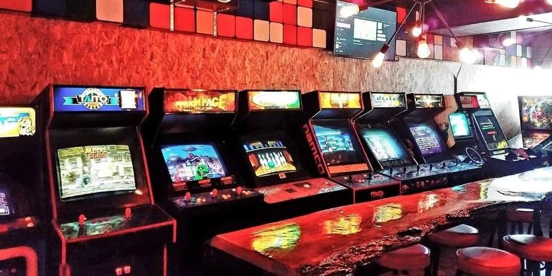 A row of pinball machines at the DK Arcade.