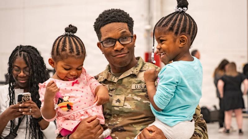 U.S. Army soldiers assigned to the 1st Armored Brigade Combat Team, 1st Infantry Division, following a rotational deployment to Poland, return home to Fort Riley, Kansas, March 18, 2026.