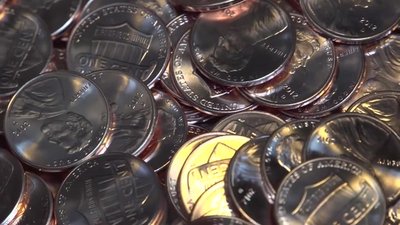 Military Exchanges End Penny Use -- Cash Rounded to Nickel