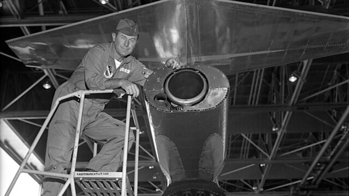 Chuck Yeager checks the rocket installation on a Lockheed Starfighter at Edwards Air Force Base.