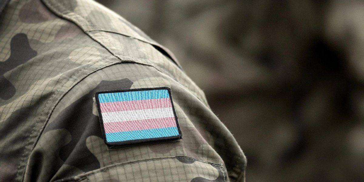 Military uniform with a transgender pride patch on the sleeve