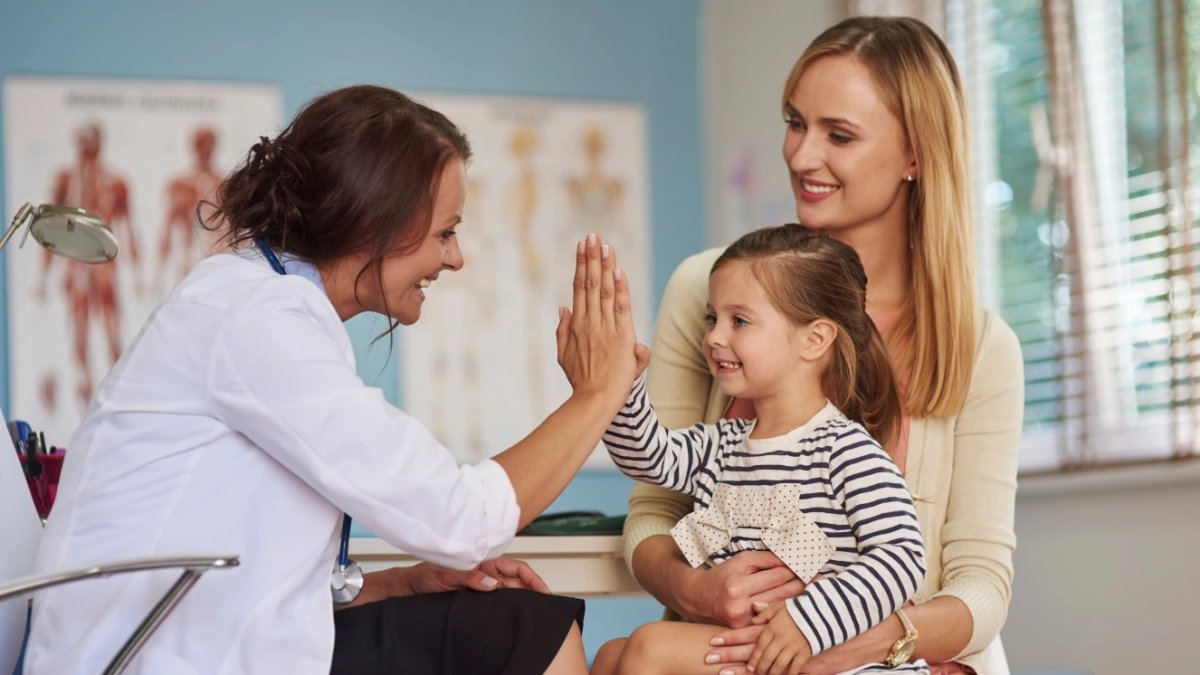 Military family visiting a doctor's office.