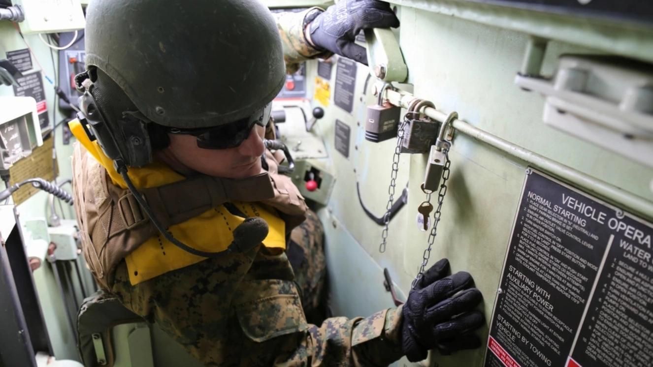 Marine operating machinery on USS Wasp during maintenance procedures