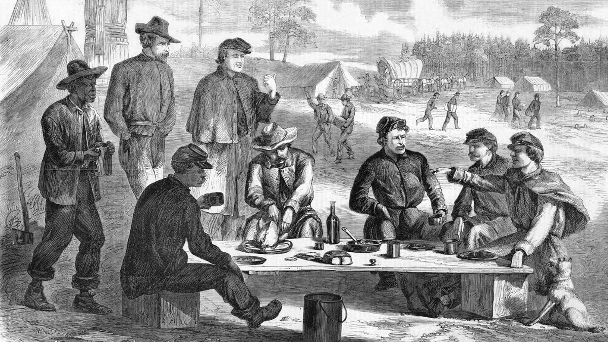 Civil War soldiers and civilians share Thanksgiving meal in military camp setting.