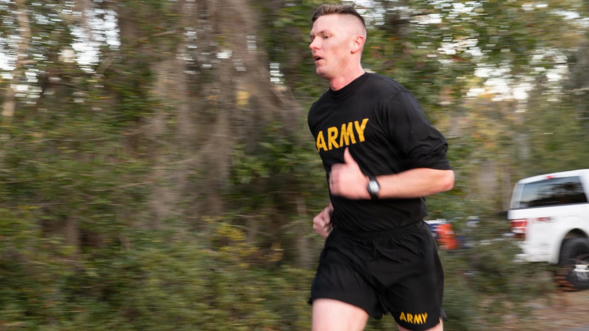 An Army soldier takes part in athletic testing by running.